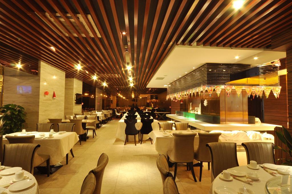 Qinzhou  Jinwan International Hotel المطعم الصورة